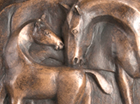 A stylised frost proof plaque for hanging on a wall showing a touching scene of a Mare tending her Foal. Suitable for the decoration of a stable yard.
Patinated in a dark bronze with highlights.